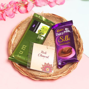 Sweet Festivities - One Cadbury Temptation and One Cadbury Dairy Milk SIlk with Complementary Roli Chawal