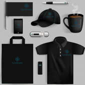 A collection of black items including a t-shirt, cap, mug, pen, and more