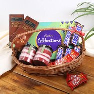 https://imgcdn.floweraura.com/the-sweetest-hamper-9872530co-A_0.jpg?tr=w-187