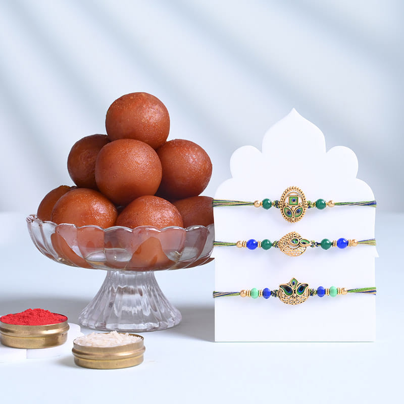 Three Designer Peacock Rakhis With Gulab Jamun