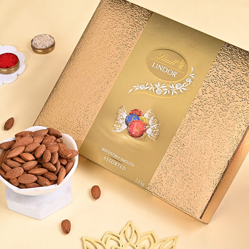 Three Designer Rakhis With Almonds N Chocolates