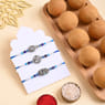 Three Designer Rakhis With Besan Ladoos