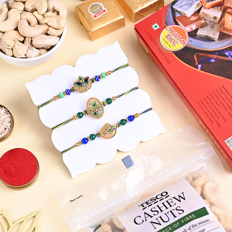 Three Designer Rakhis With Sweets N Nuts