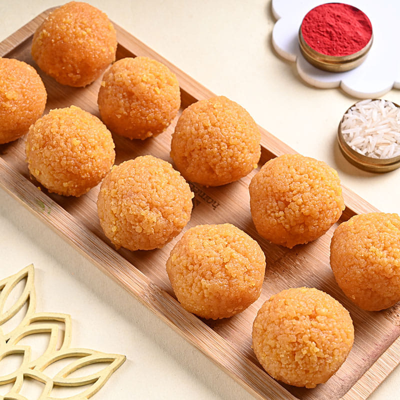 Three Divine Silver Rakhis With Besan Laddu