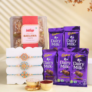 Three Fancy Rakhi Set N Dessert Bliss Hamper
