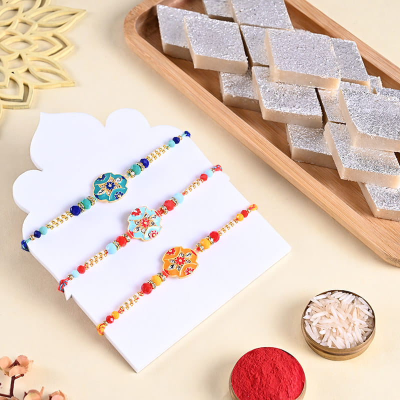 Three Floral Designer Rakhis With Kaju Katli