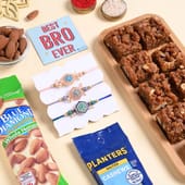 Three Floral Motif Rakhis With Sweets N Nuts