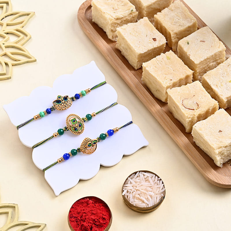 Three Peacock Designer Rakhi With Soan Papdi