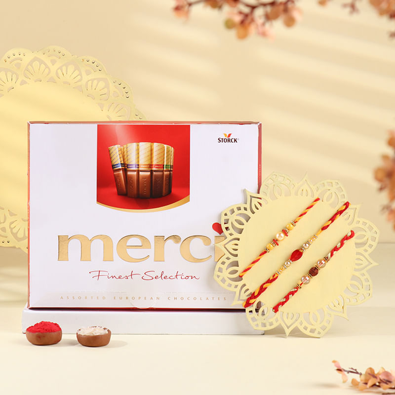 Three Pearl N Rudraksha Mauli Rakhis With Chocolate