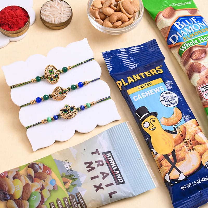 Three Royal Mayura Rakhis N Nutty Treats Hamper