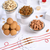 Three Sacred Rudraksha Rakhis with Festive Treats