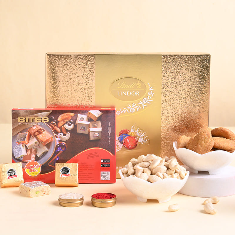 Three Silver Charm Rakhis N Treats Hamper