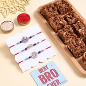 Silver Spiritual Rakhi Trio With Dhoda Burfi