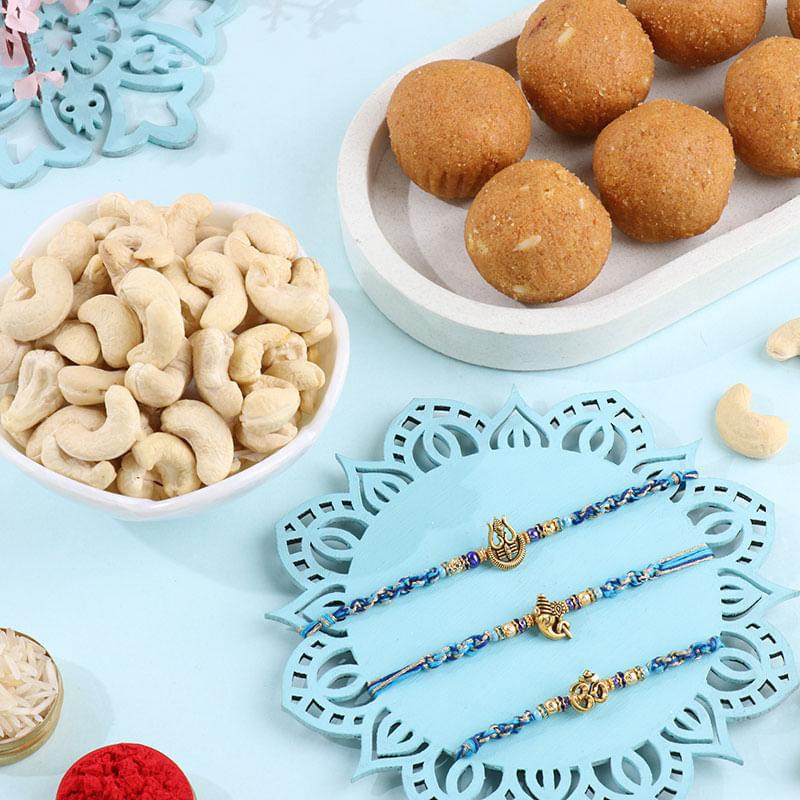 Three Spiritual Rakhis With Cashew N Besan Ladoo