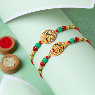 Vibrant Stone Embedded Golden Rakhi Set of 2