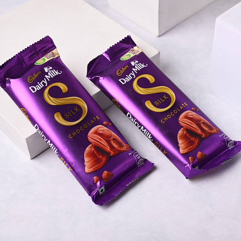 Traditional Meenakari Rakhis With Dairy Milk Silk
