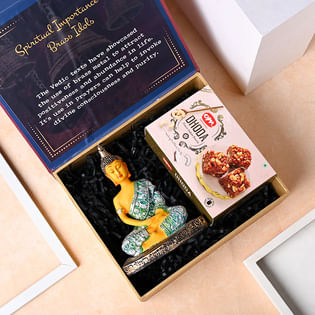 Transcendent Buddha Figurine With Dhoda Sweets Hamper