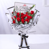 Bouquet of 15 Red Roses In White Premium Paper