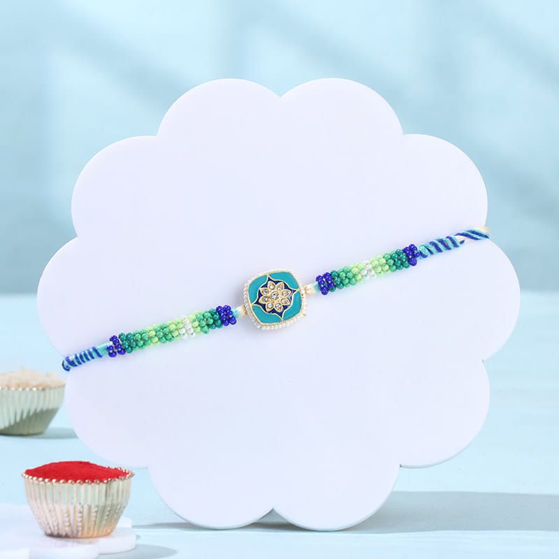 Turqoise Bloom Rakhi N Treats Hamper