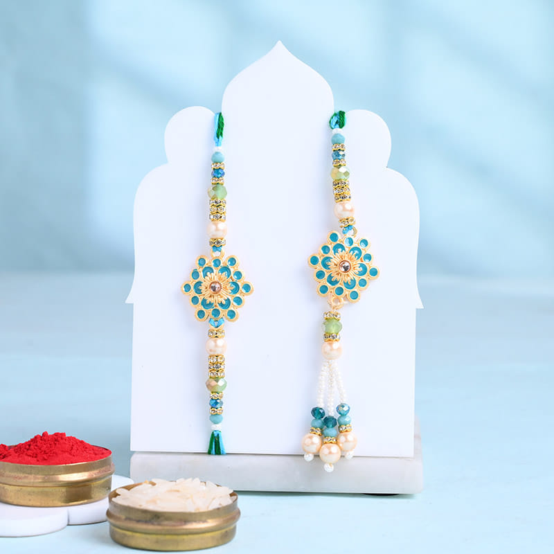 Turquoise Floral Bhaiya Bhabhi Rakhis With Baklawa