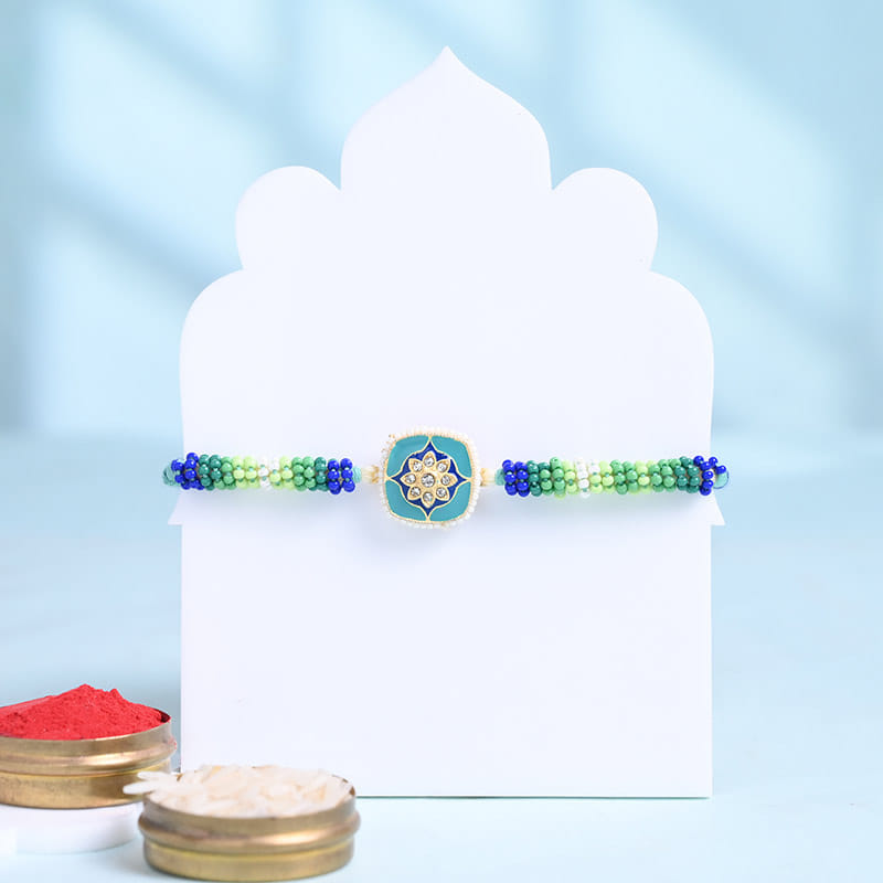 Turquoise Floral Rakhi With Ferrero Rocher