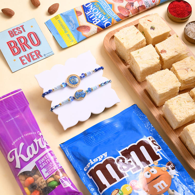 Blue Gold Rakhi Duo N Treats Hamper