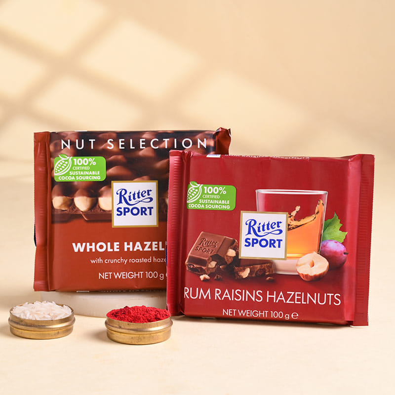 Two Blush Stone Rakhis With Hazelnut Chocolates