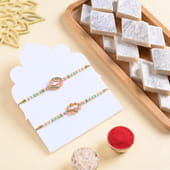 Two Blush Stone Rakhis With Kaju Katli
