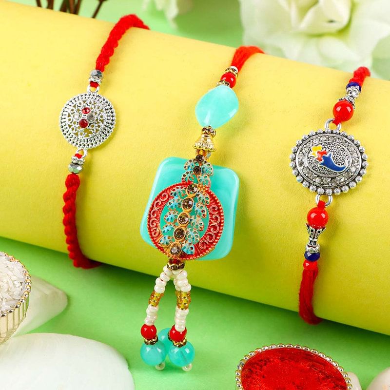 Two Designer Rakhis And One Lumba Rakhi