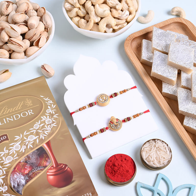 Two Divine Rakhis N Blissful Treats Hamper
