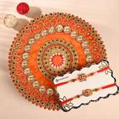 Two Divine Rakhis N Orange Tika Thali Combo