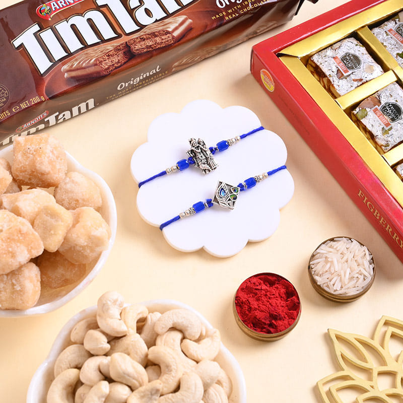 Two Divine Rakhis N Snackful Hamper