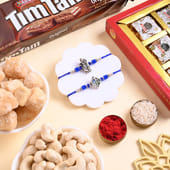 Two Divine Rakhis N Snackful Hamper