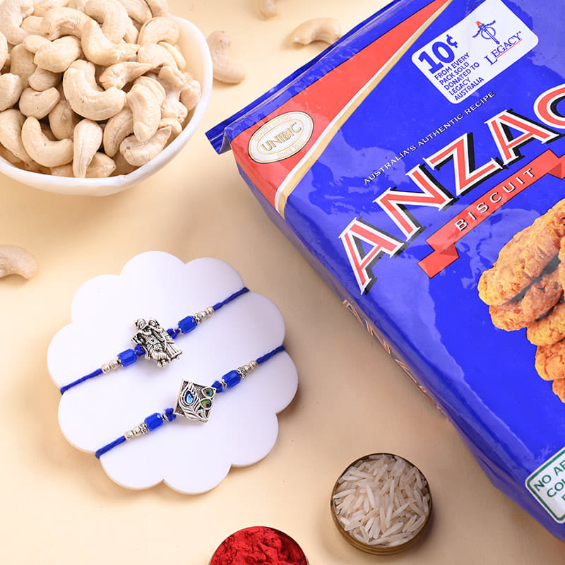 Two Divine Rakhis With Biscuits N Cashews