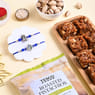 Send Rakhi to UK Online with Set of 2 Divine Rakhi, Cashews and Dhoda Burfi