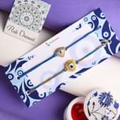 Order Two Evil Eye Rakhi Set Online - Good Luck Rakhis