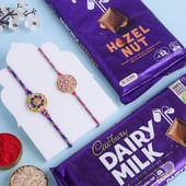 Two Floral Designer Rakhis With Chocolates