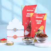 Two Floral Pastel Rakhi With Gourmet Snacks