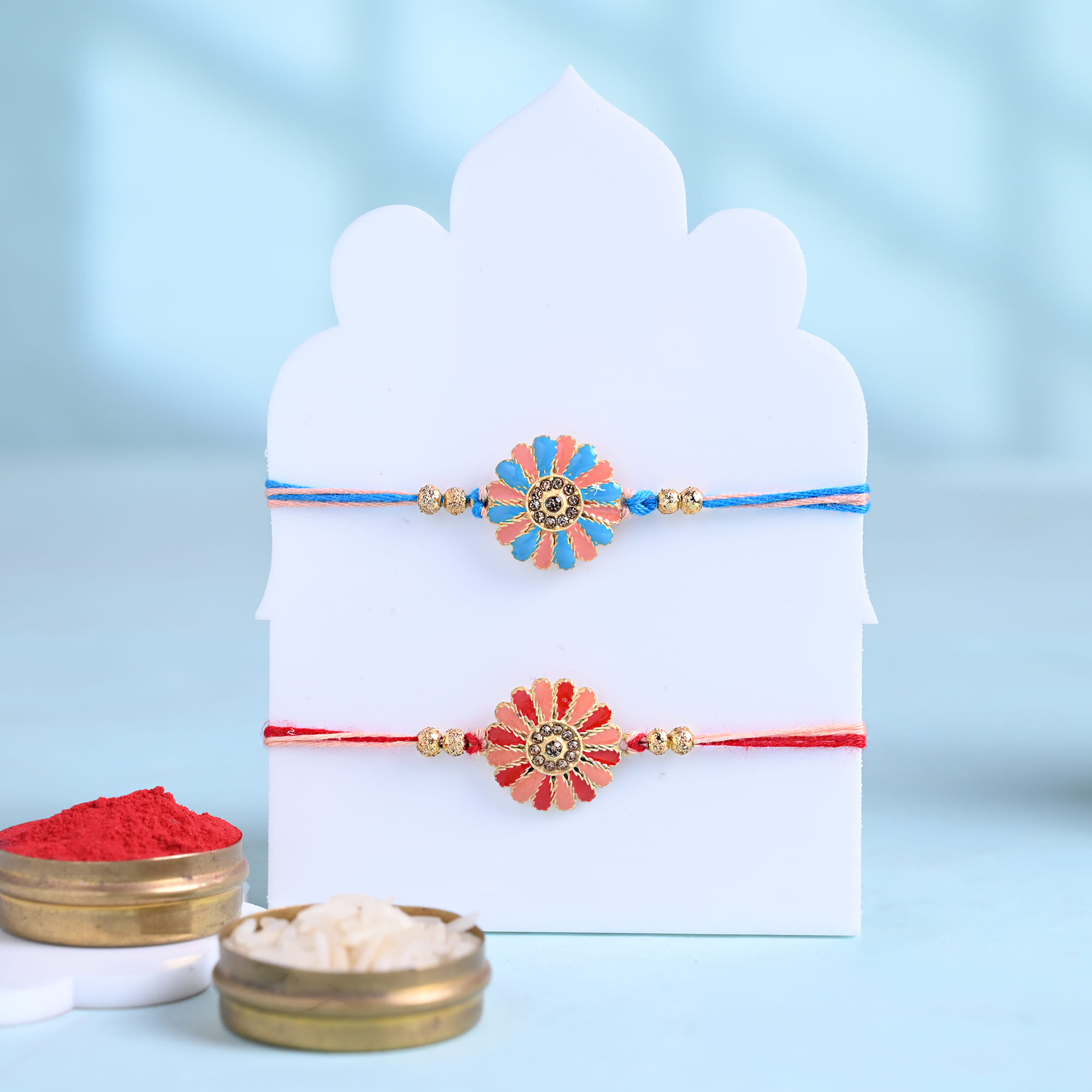 Two Floral Pastel Rakhi With Gourmet Snacks
