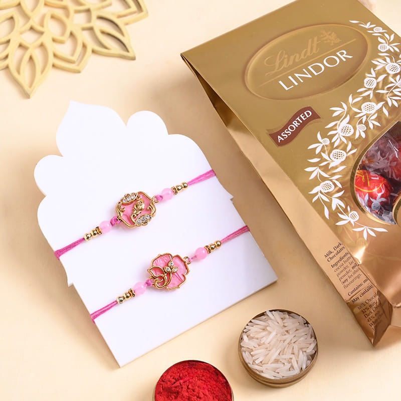 Two Floral Pink Rakhis With Assorted Chocolates