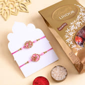 Two Floral Pink Rakhis With Assorted Chocolates