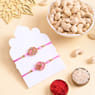 Two Floral Pink Rakhis With Cashews