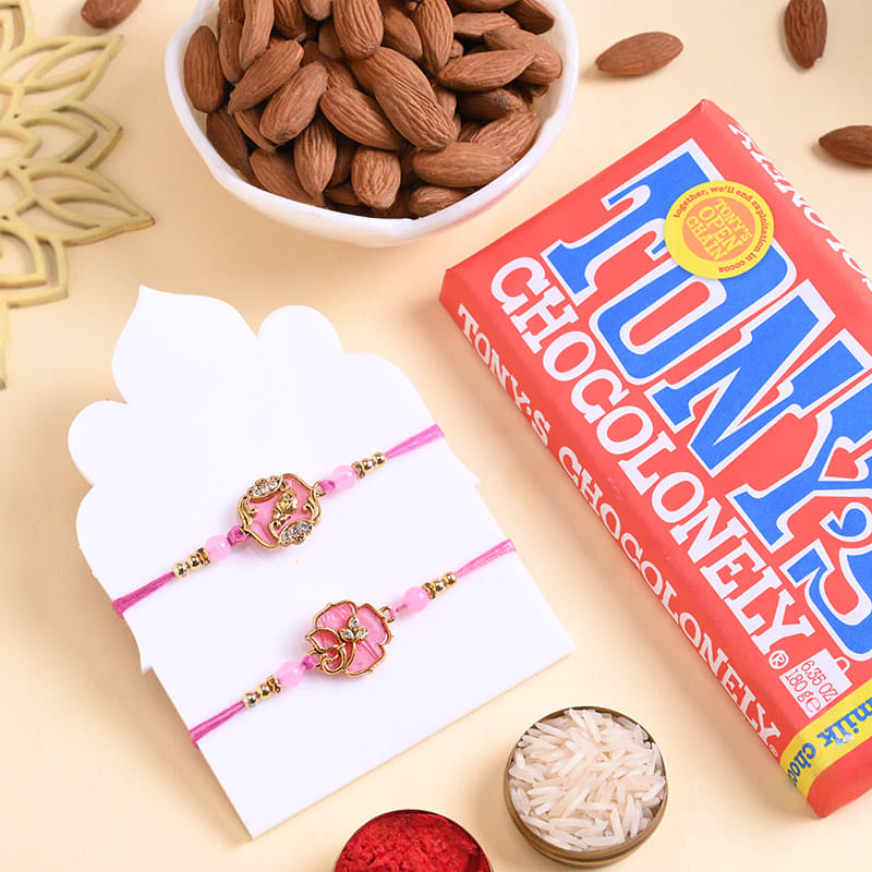 Two Floral Pink Rakhis With Choco N Almonds