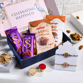 Two Floral Rakhis With Chocolates N Almonds