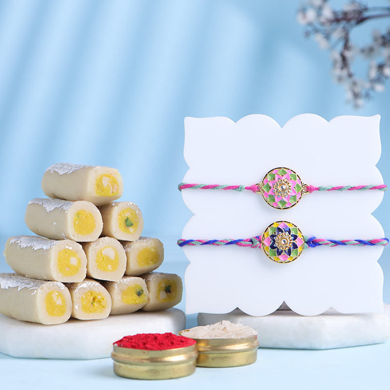 Two Multicolour Floral Rakhis With Kaju Pista Roll-Canada