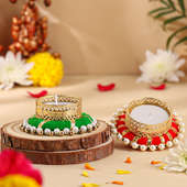 Two Ornate Pearl Diyas