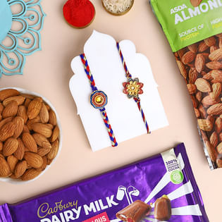 Two Ornate Rakhis With Almonds N Chocolate