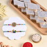 Send Rakhi to UK Online with Set of 2 Peacock Designer Rakhi and Kaju Katli