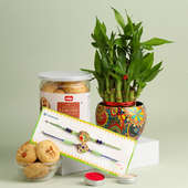 Two Peacock Rakhis With Lucky Bamboo N Almond Cookies