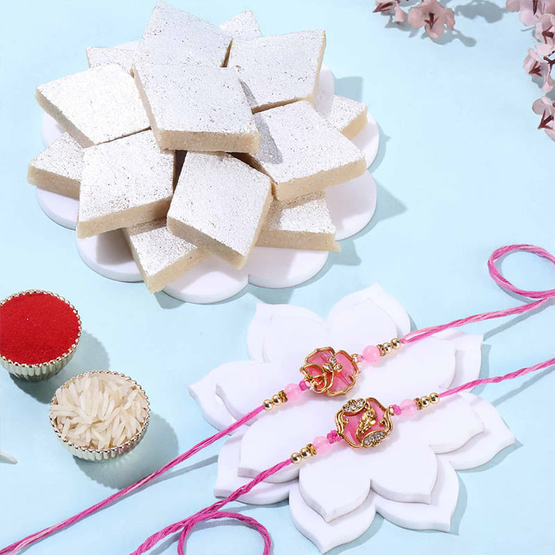 Two Purple Rakhis With Kaju Katli